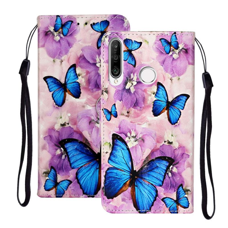 Housse Huawei Y6p Papillons Bleus Dans Les Fleurs