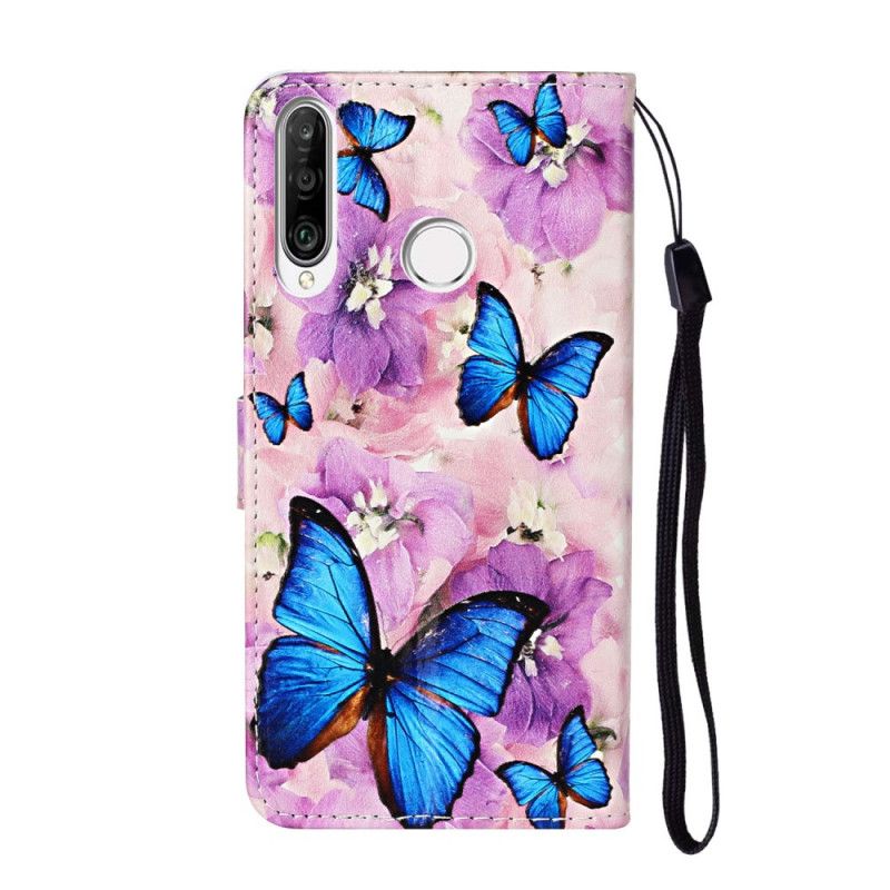 Housse Huawei Y6p Papillons Bleus Dans Les Fleurs