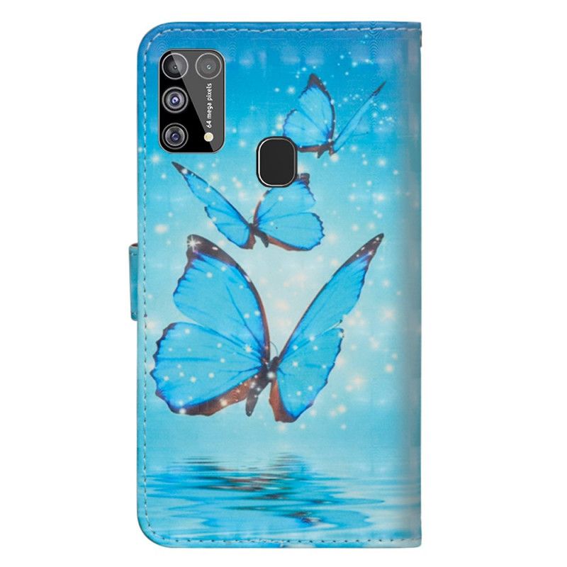 Housse Samsung Galaxy M31 Papillons Bleus Volants