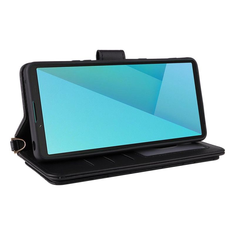 Housse Sony Xperia 10 VII Matelassée avec Lanière et Dragonne