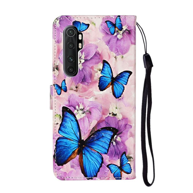 Housse Xiaomi Mi Note 10 Lite Papillons Bleus Dans Les Fleurs